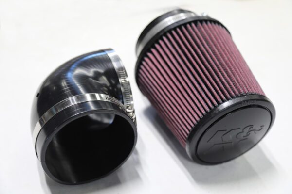 K&N air filter and ninety degree silicon elbow with holding bracket included - close view